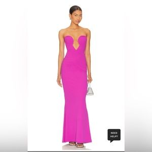 Incredibly flattering silhouette dress in electric pink. Sheer mesh in the front